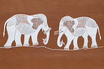 Traditional painting of elephants on mud wall of house during Diwali festival, Bada Gaire Killa village, South of Tonk, Rajasthan, India