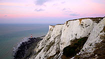 View of the chalk cliffs and lighthouse at Beachy Head at sunset, Eastbourne, East Sussex, England, UK, June 2017. Hellier