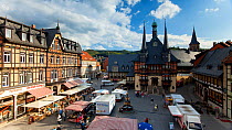 Timelapse of people erecting a market in front of the town hall, Markt Platz, Wernigerode, Hatz Mountains, Germany, July 2015. Hellier