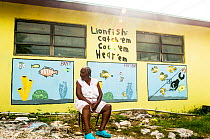 Mural painted on the side of a small grocery store on Eleuthera Island, Bahamas depicting how the fate of the Bahamian fishery is tied closely to that of the invasive lionfish (Pterois volitans). Eleu...
