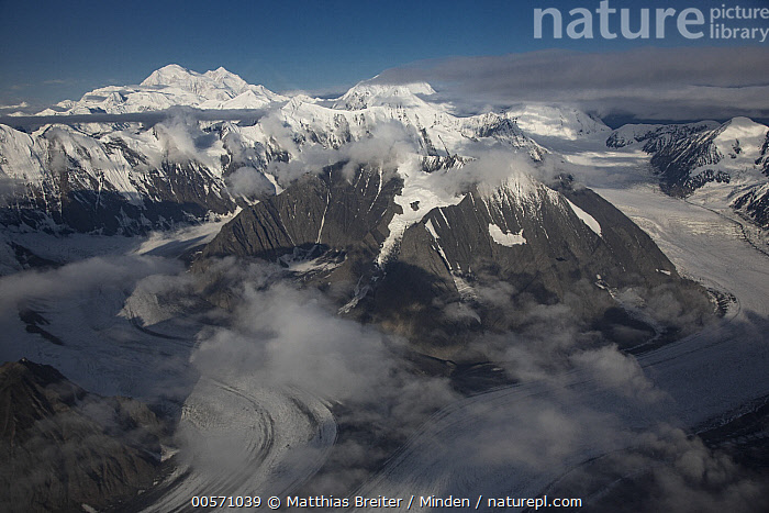 Stock photo of Mount Denali rising above Alaska Range and Buckskin ...