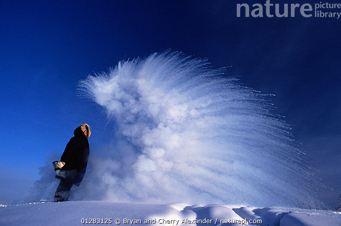 Stock photo of Boiling water exploding into vapour and ice when thrown ...