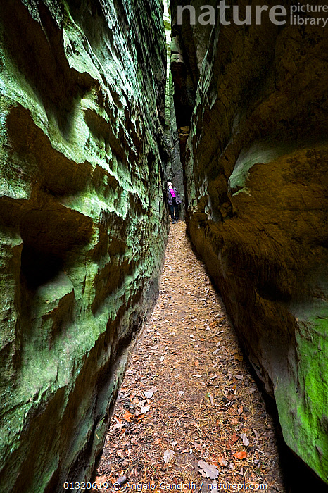 Narrow Path Rocks Stock photo of People walking along the narrow path between rocks at ...