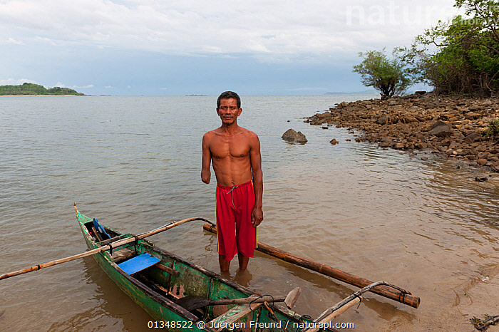 Stock photo of A fisherman who lost his arm dynamite fishing. Palawan,  Phillipines, May…. Available for sale on
