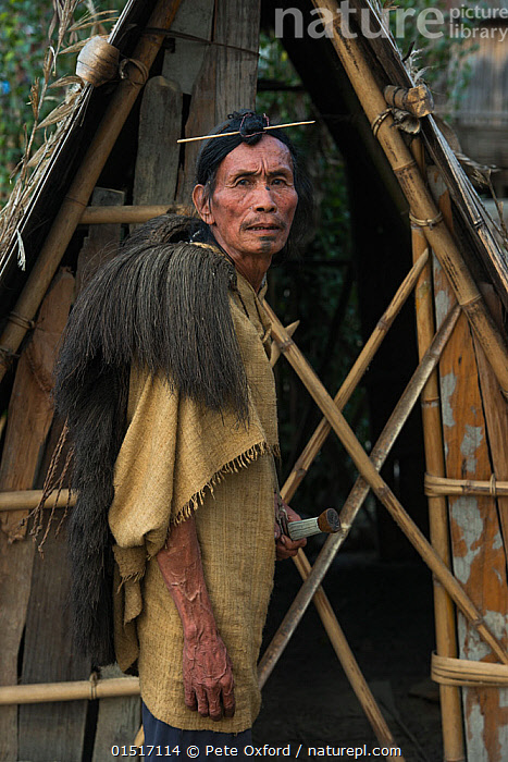 Apatani man in traditonal with hair knot wearing trational dress and hat.  Ziro. Arunachal Pradesh. India Stock Photo - Alamy