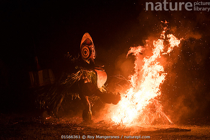 Stock photo of Baining men in traditional fire dance ceremony. Men ...