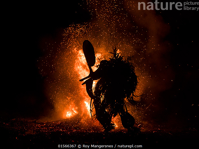 Stock photo of Baining men in traditional fire dance ceremony. Men ...