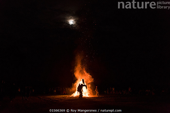 Stock photo of Baining men in traditional fire dance ceremony. Men ...