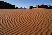 Ripples in sand with buttes in background, Monument Valley Navajo Tribal Park, Arizona