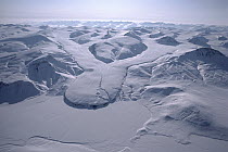 Converging glacier and snow covered mountain, Ellesmere Island, Nunavut, Canada