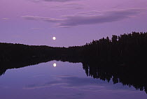 Full moon over lake, Boundary Waters Canoe Area Wilderness, Minnesota