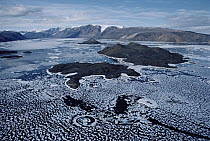 Ice floes surrounding islands and snow-covered peaks, Ellesmere Island, Nunavut, Canada