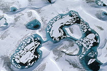 Blue ice pools in arctic icefield, Ellesmere Island, Nunavut, Canada