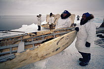 Bowhead Whale (Balaena mysticetus) hunters, Inuits in traditional clothes with sealskin boat waiting for whales, Brower fishing camp, Barrow, Alaska