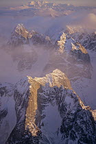 Snow-covered peaks of the Alaska Range with Mt Denali in the background, Alaska