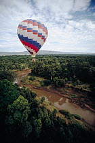 Tourists ballooning over rainforest, Africa