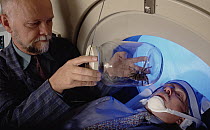 Tarantula (Theraposidae) shown to Stanford professor and arachnophobia expert, C Barr Taylor, by Dr Gunnar Gotestam while a pet scanner records his fear response, Norway