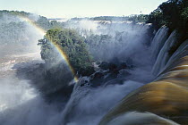 Rainbow over Iguacu Falls, world's largest waterfalls, Brazil and Argentina border