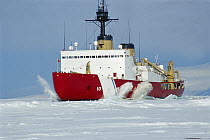 Coast Guard icebreaker cutting through sea ice, creates an ice channel that allows marine life to travel deeper into sea ice, McMurdo Sound, Antarctica