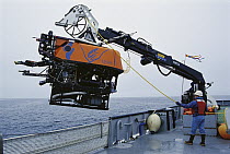 Rov Ventana submersible is lowered by crane from MBARI ship, Point Lobos, Monterey Bay, California