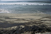 Oil spill on beach, Huntington Beach, California