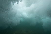Wave breaking as seen from underwater, North Shore, Oahu, Hawaii