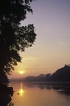 Sunrise over lower reaches of the Tambopata River, Tambopata-Candamo Reserved Zone, Amazon Basin, Peru