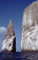 Kicker Rock an old eroded tufa formation with sailboat, Galapagos Islands, Ecuador