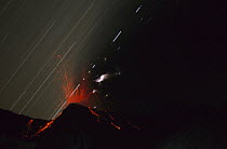 Mt Ruapehu time exposure shows lava bomb traces and lightning in swirling ash plume from 1996 eruption, Tongariro National Park, New Zealand