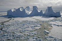 Water worn iceberg in sea ice, Lazarev Sea, Princess Astrid Coast, east Antarctica