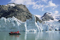 Tourists at glacier, southern Greenland Fjords, Prins Christian Sound, Greenland