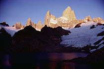 Sunrise glow on high granite spires, Fitzroy Massif, Los Glaciares National Park, Argentina