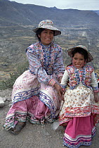 Collagua woman and daughter in traditional everyday dress, Colca Canyon, Southern Andes, Peru