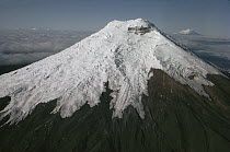 Cotopaxi Volcano rising 4,897 meters above the Andean Plateau, aerial view from 5,879 meters, Ecuador