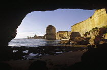 View from access tunnel of Twelve Apostles and of cliffs that protect Little Blue Penguin colonies from predators, Port Campbell, Victoria, Australia
