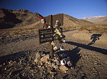 Tea kettles decorating sign at Tea Kettle Junction, Death Valley National Park, California