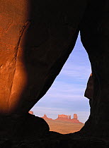 Teardrop Arch with buttes in distance, Monument Valley Navajo Tribal Park, Arizona
