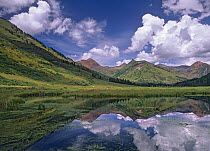 Ruby Range reflected in lake Gunnison National Forest, Colorado