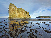 Coastline and Perce Rock, a limestone formation, at low tide, Quebec, Canada