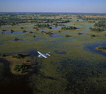 Safari airplane flying over the flooded Okavango Delta, Botswana