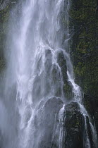 Close up of cascades of Stirling Falls, Milford Sound, Fjordland National Park, South Island, New Zealand