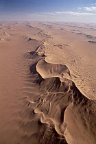 Aerial view of transverse sand dune pattern in sand sea of Namib-Naukluft National Park, Namibia