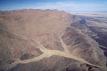 Aerial view of dry Ugab River coming off of Brandberg Mountain, Namib Desert, Damaraland, Namibia
