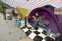Workers in temporary shelters after the May 12, 2008 earthquake and landslides, CCRCGP, Wolong, China