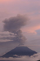 Tungurahua volcano erupting, at 5,023 meters this active stratovolcano causes frequent tremors in the neighboring city of Banos, among the Andes Mountains, Ecuador