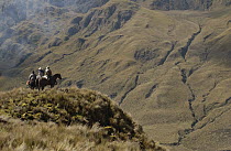 Chagras or cowboys on an overnight ride at a hacienda during the annual cattle round-up, Ecuador