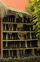 Guest's boots at a hacienda in the Andes Mountains, Ecuador
