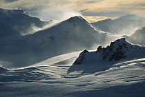Windblown snow at dawn on the Franz Josef Glacier, winter, Westland National Park, Southern Alps, New Zealand
