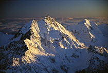 Mt Cook, also called Aoraki, and Mt Tasman, aerial view at dawn of eastern faces from above Tasman Glacier, South Island, New Zealand