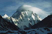 Wind cloud over the summit of K2, second highest peak in the world towering over the Godwin Austen Glacier in the spring, Karakoram Mountains, Pakistan